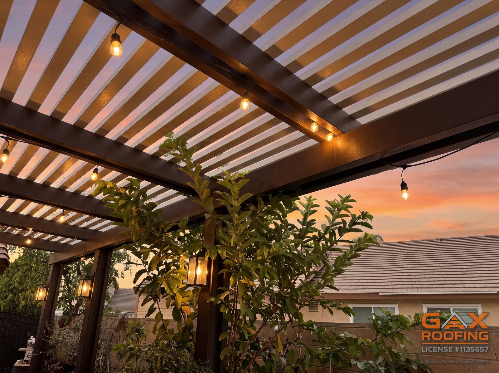 Alumawood patio cover at twilight by GAX Roofing