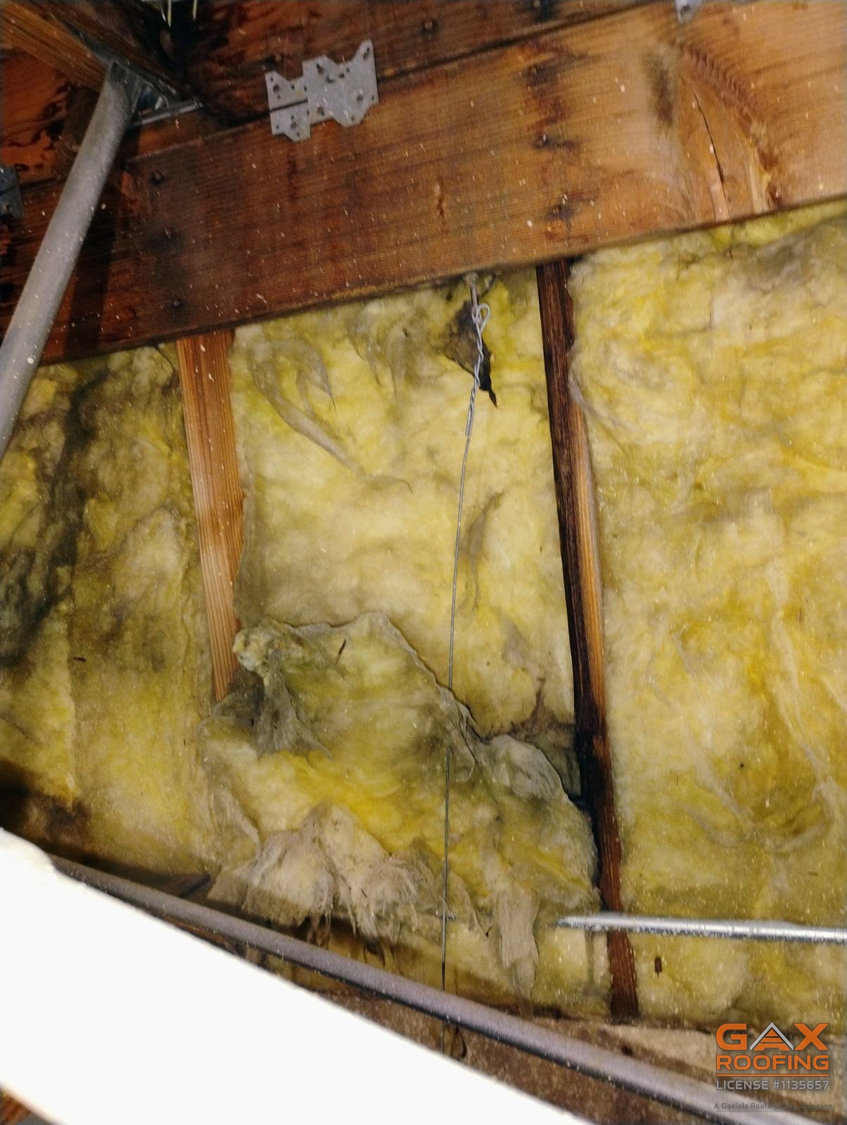 Water staining on a roof rafter found in an Azusa attic inspection