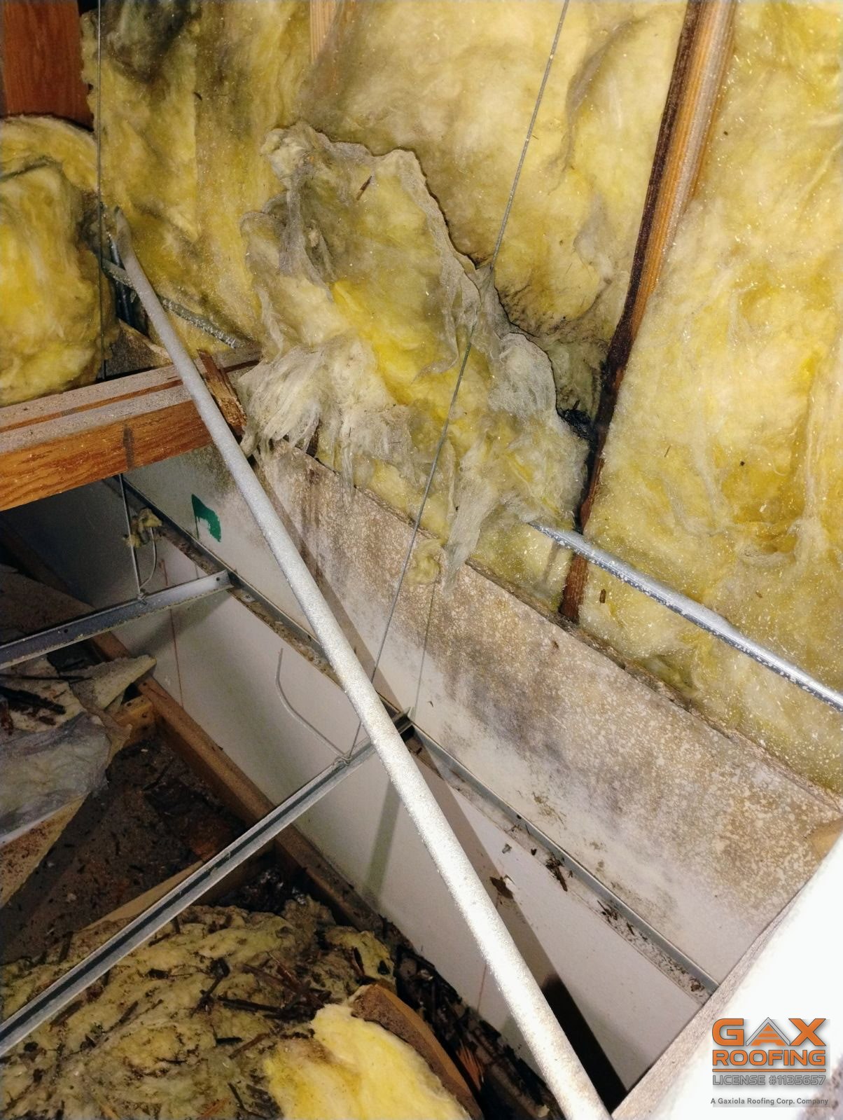 Attic inspection in Azusa, CA showing staining near the eave under the roof deck