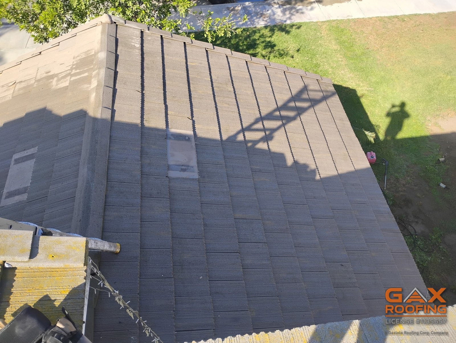 Chimney on an Arcadia tile roof after flashing repair and power wash