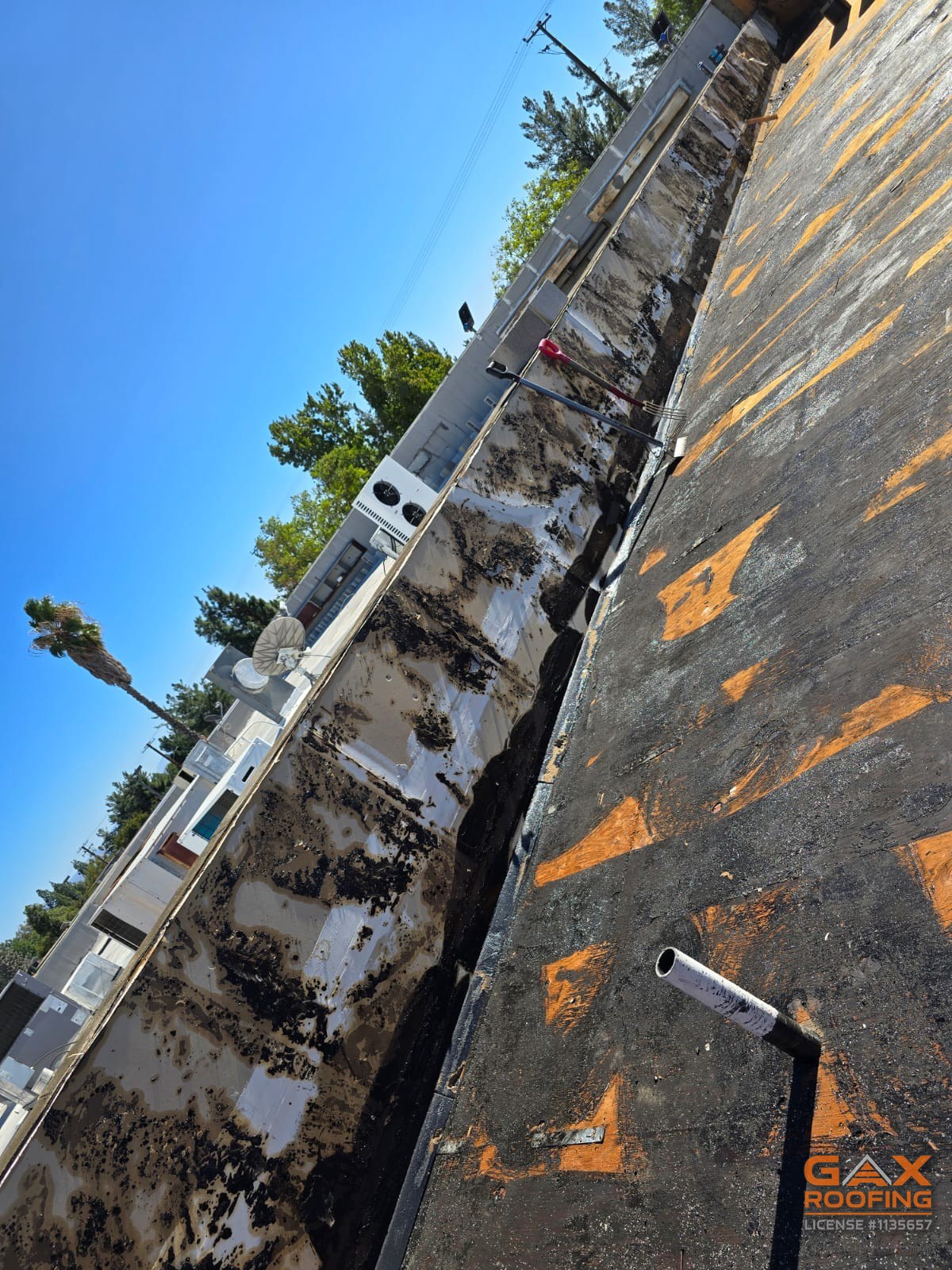 Torch applied modified bitumen flat roof on a Redlands, CA commercial building installed by GAX Roofing