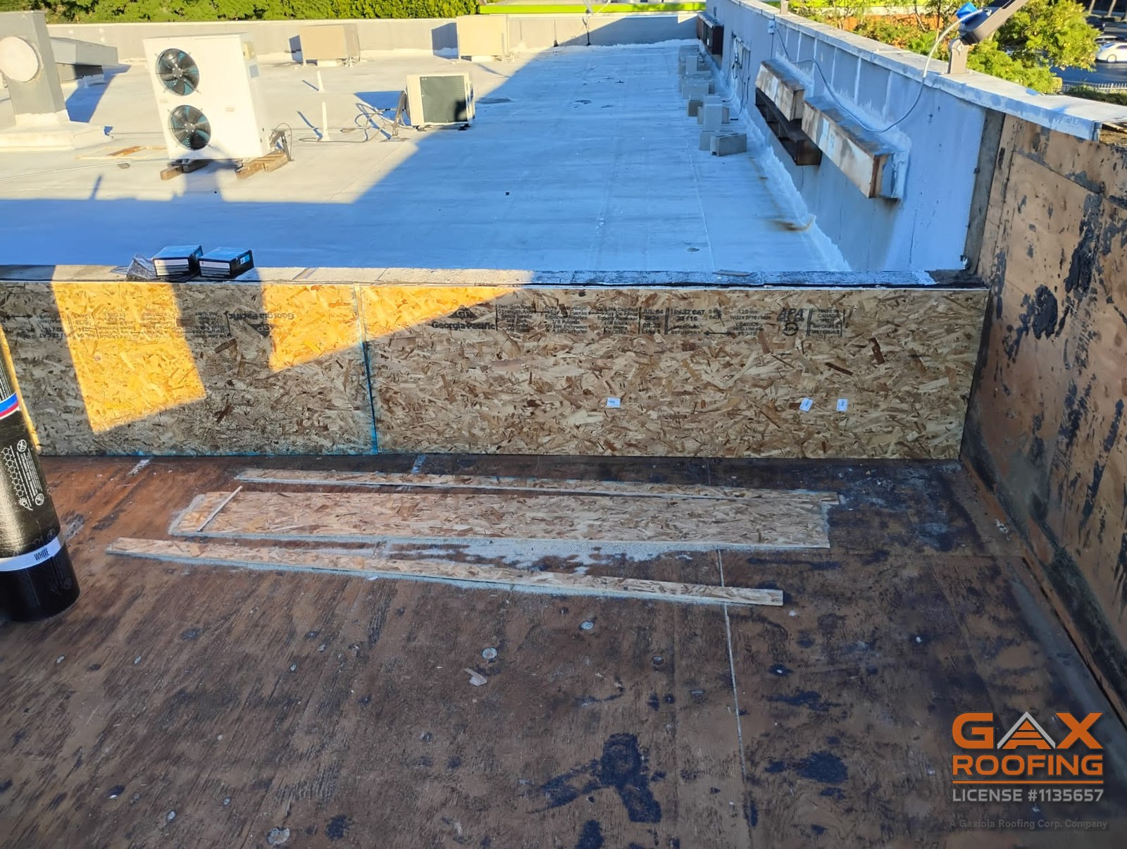 Low slope commercial roof in Redlands, CA rebuilt with a granulated torch applied cap sheet