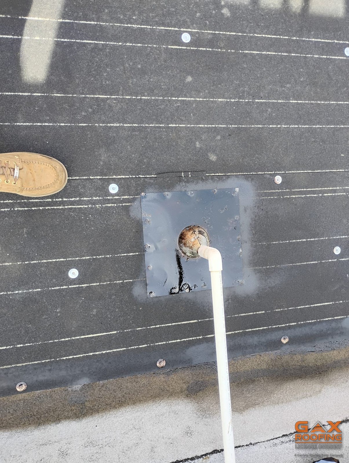 Low slope commercial roof in Redlands, CA rebuilt with a granulated torch applied cap sheet