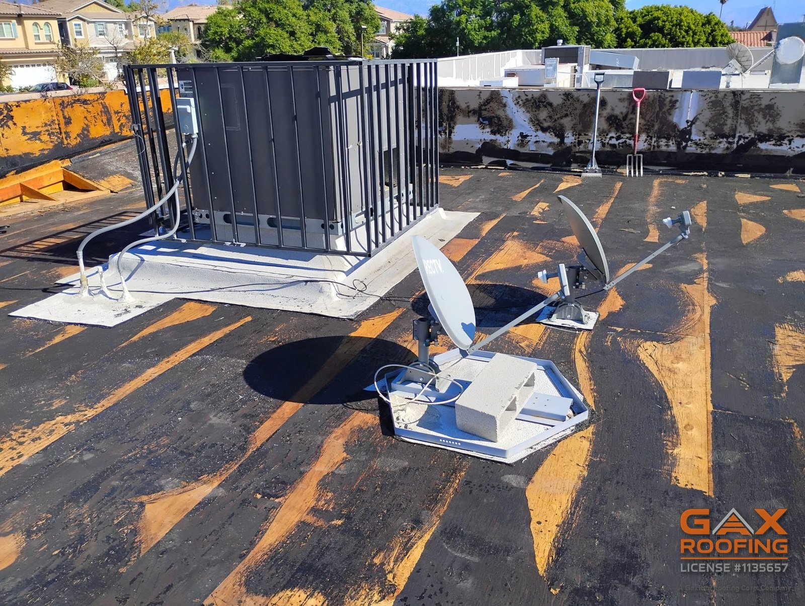Commercial flat roof replacement in Redlands, CA by GAX Roofing, torch applied Polyglass Polyfresko granulated cap sheet