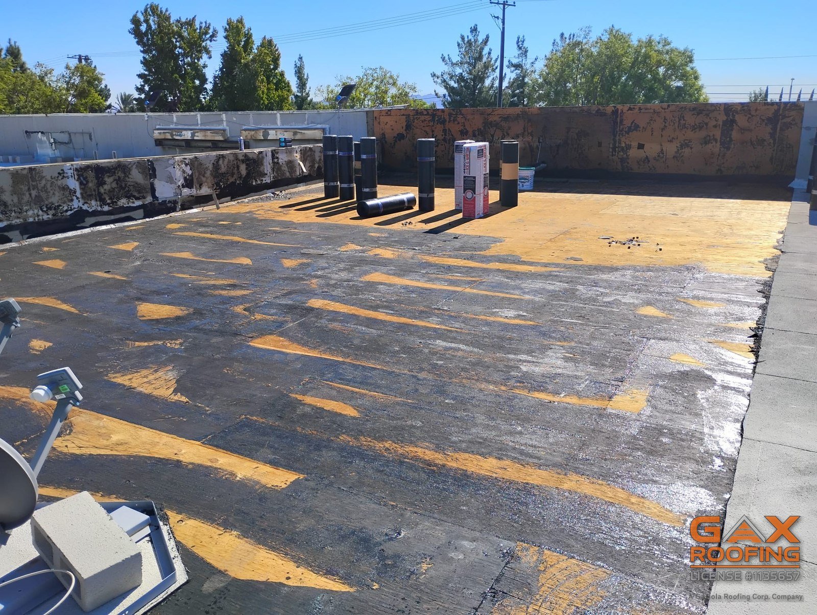 Torch applied modified bitumen flat roof on a Redlands, CA commercial building installed by GAX Roofing