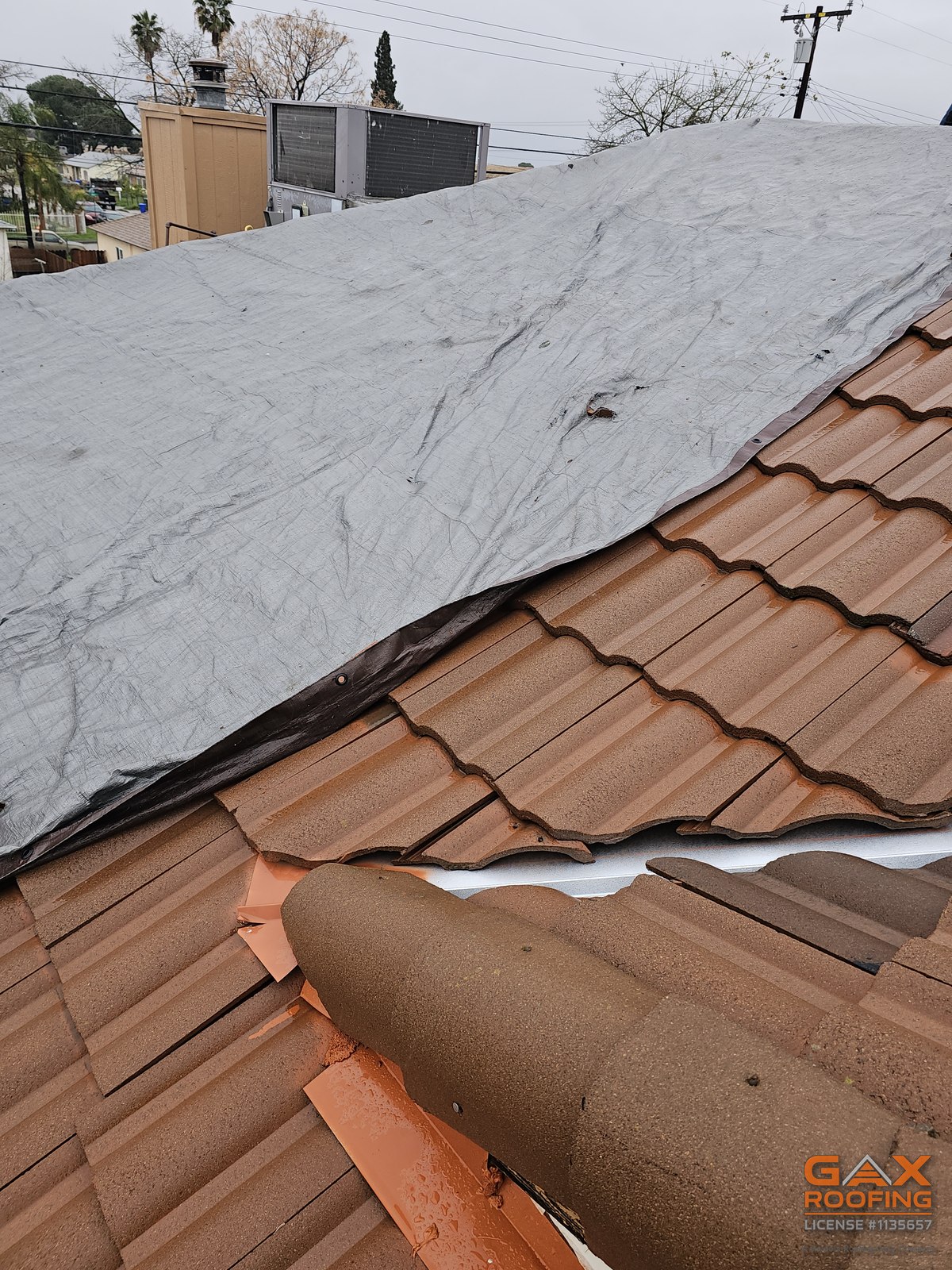 Tarped roof section on an emergency call in Tustin, California
