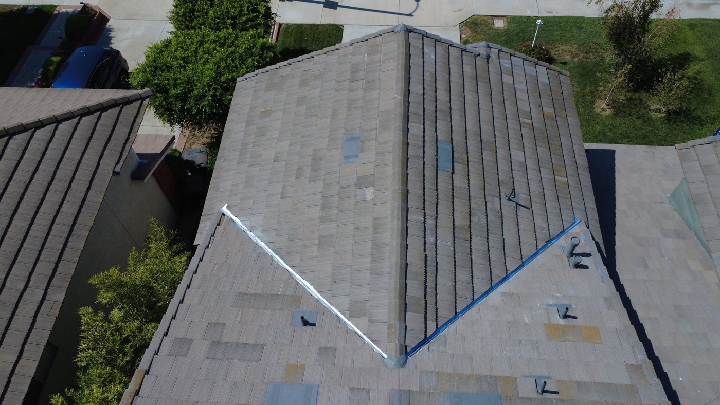 Overhead drone view of tile roof valleys during a job in Yorba Linda, CA