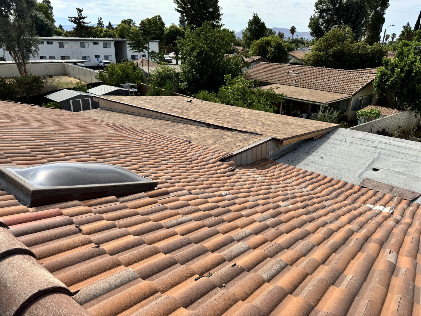 Concrete tile laid onto a flat patio roof section in Riverside