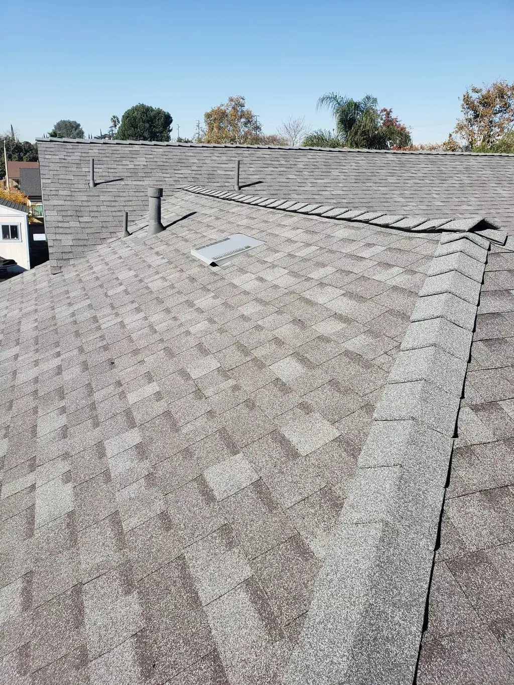 Completed shingle roof replacement by GAX Roofing