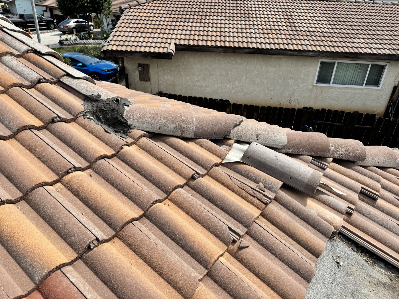 Broken and displaced ridge tiles found during a tile roof inspection in Riverside