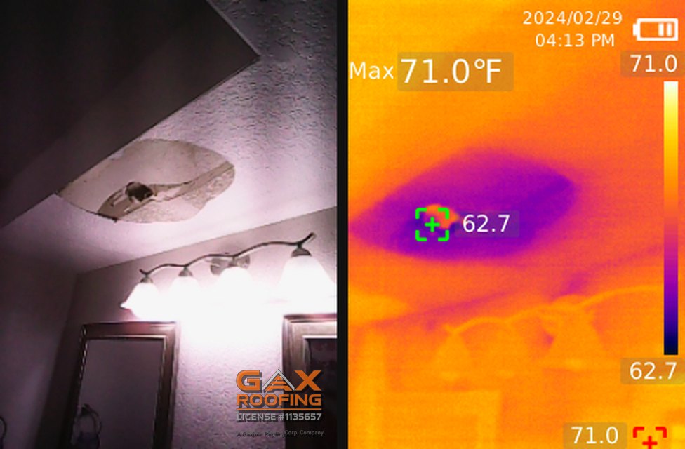 Bathroom ceiling with a visible stain beside its thermal frame showing the cold wet area is larger than the stain
