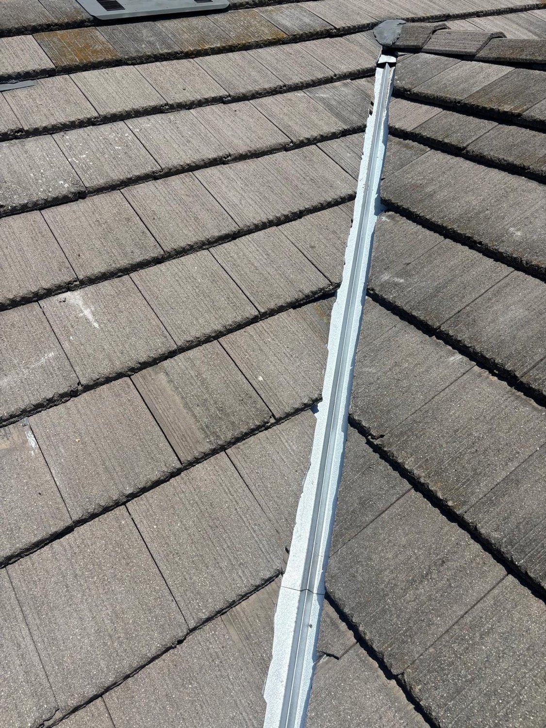 Open tile roof valley with new metal in Yorba Linda by GAX Roofing
