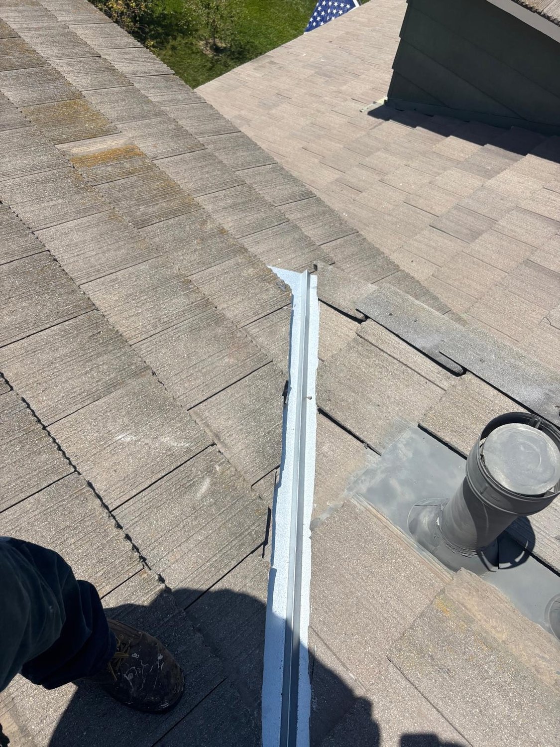 New open valley metal installed on a tile roof by GAX Roofing in Yorba Linda