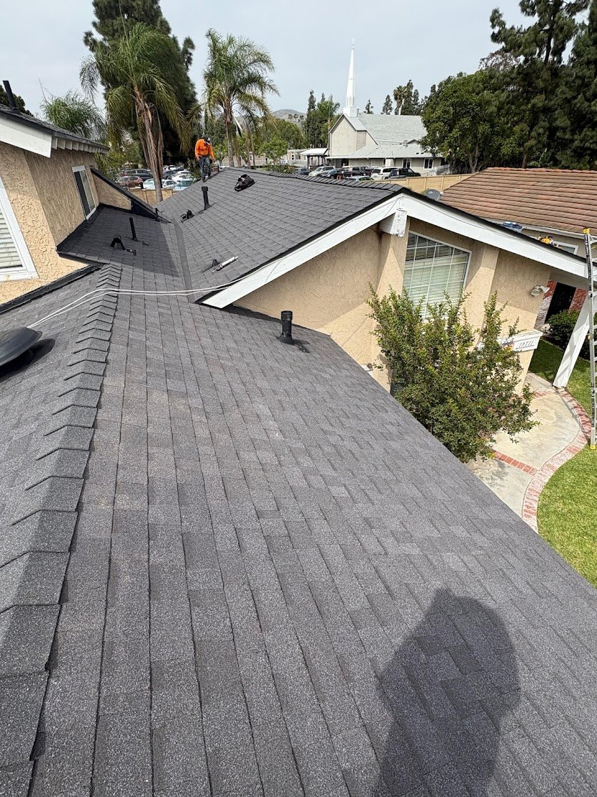 Completed shingle roof ridge cap