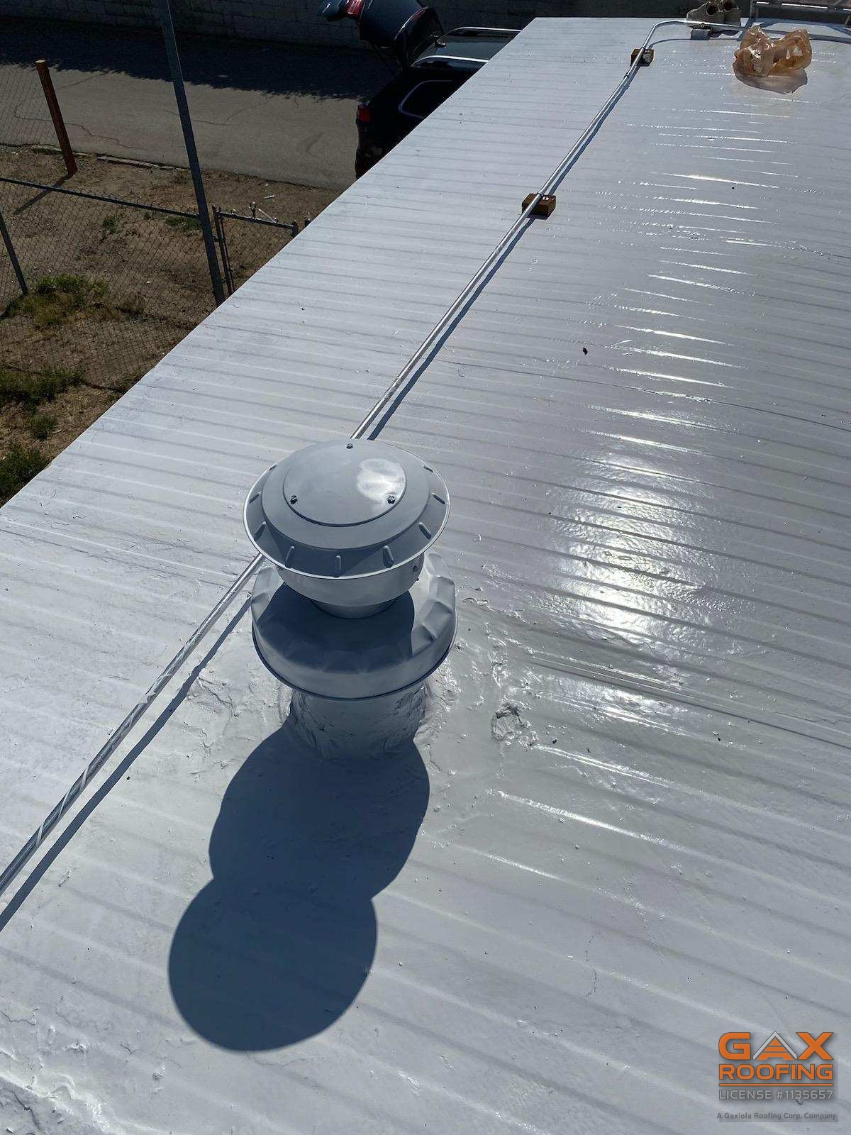 Silicone coated vent penetration on a mobile home metal roof in Ontario, CA