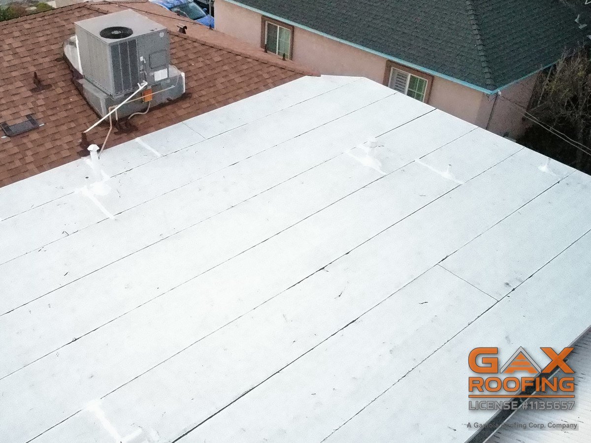Finished Polyfresko flat patio roof by GAX Roofing on an El Monte, California home