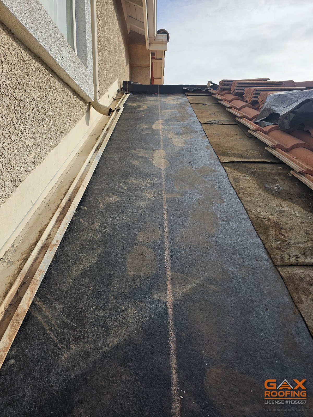 Roof to wall flashing leak in Rowland Heights, California