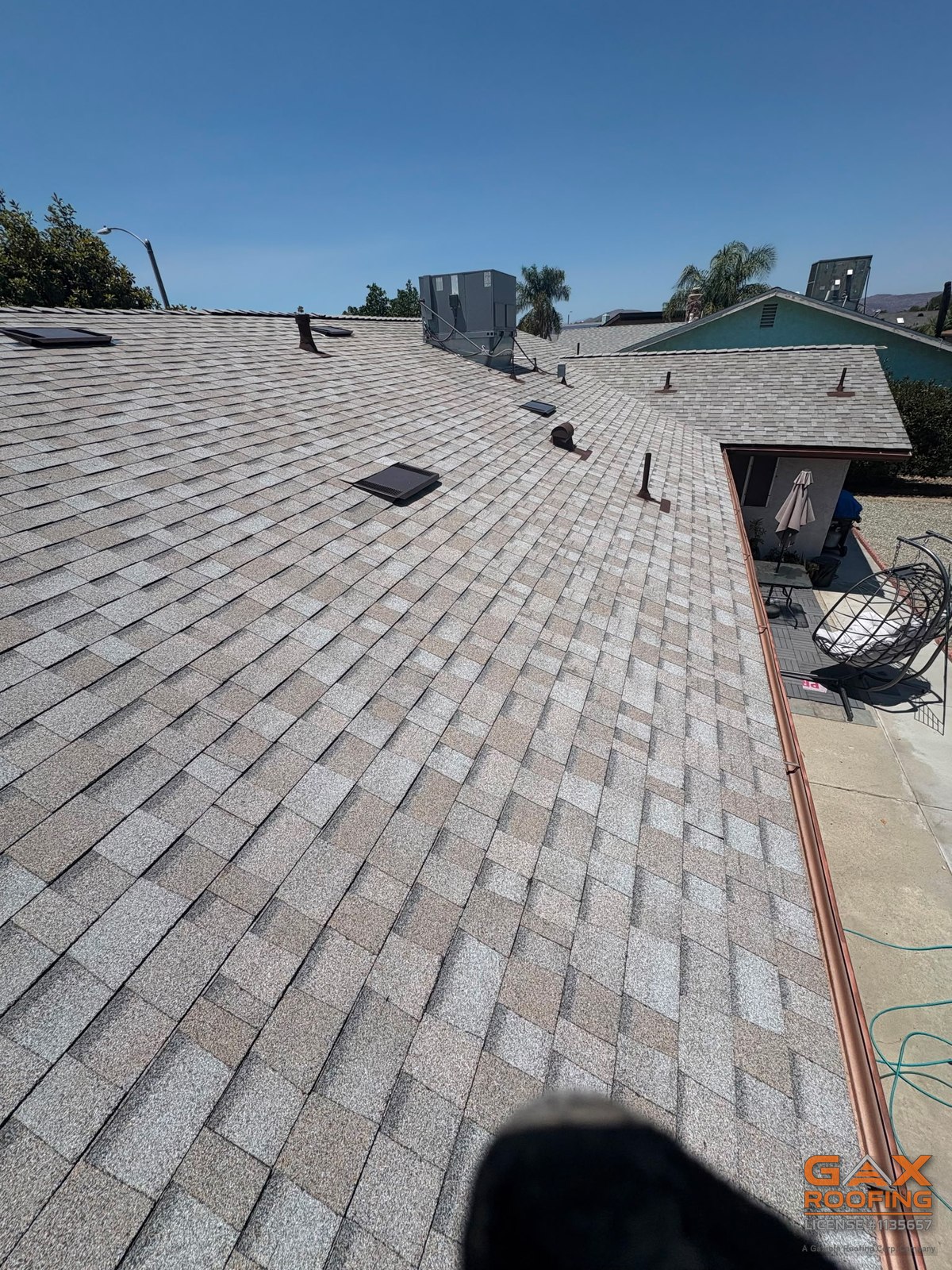 Close-up of a finished shingle field by GAX Roofing