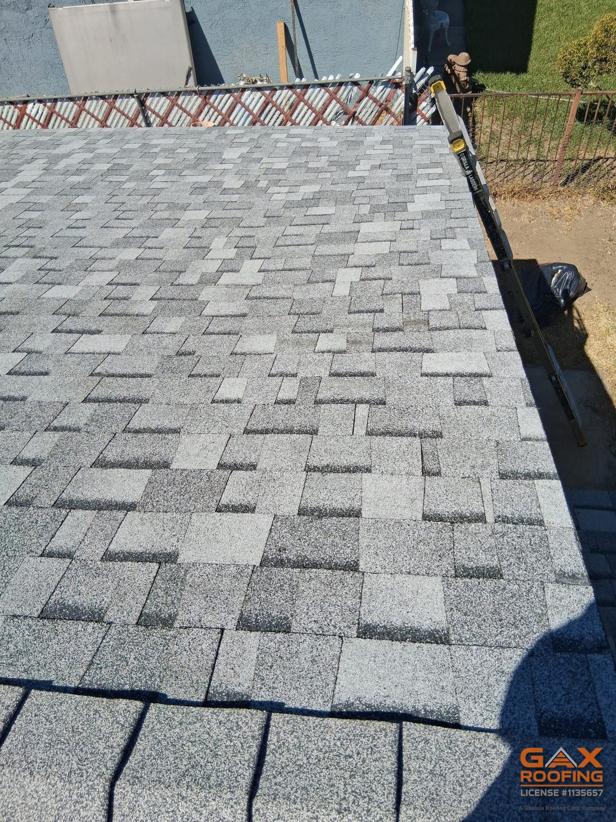 The finished cool-rated shingle roof in Colton after the full resheet