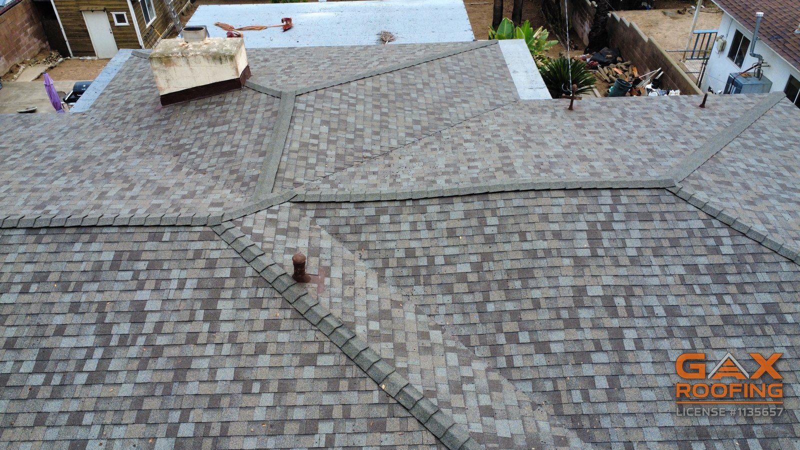 Hip lines and cap shingles on a finished shingle roof replacement in San Bernardino