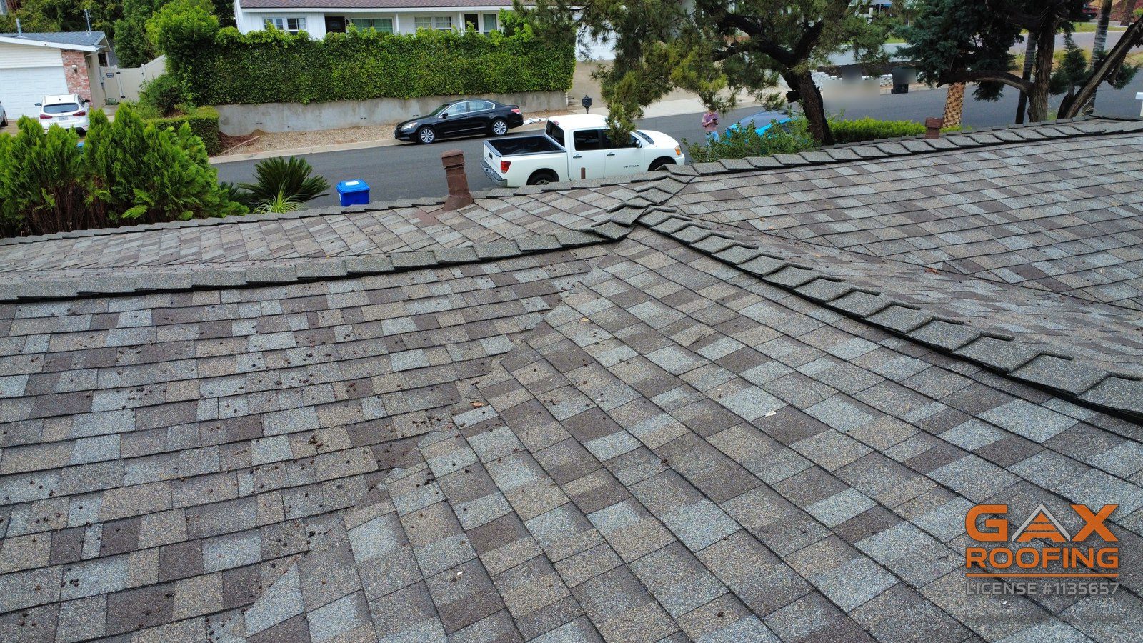 Ridge of a finished Owens Corning Duration COOL roof in San Bernardino, looking out toward the street