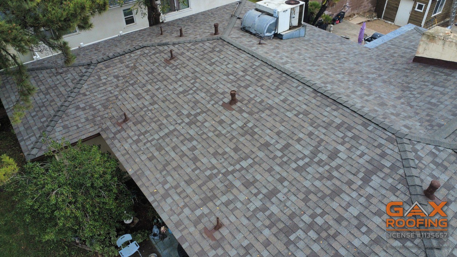 Finished Owens Corning Duration COOL shingle roof replacement on a hip roof home in San Bernardino, California