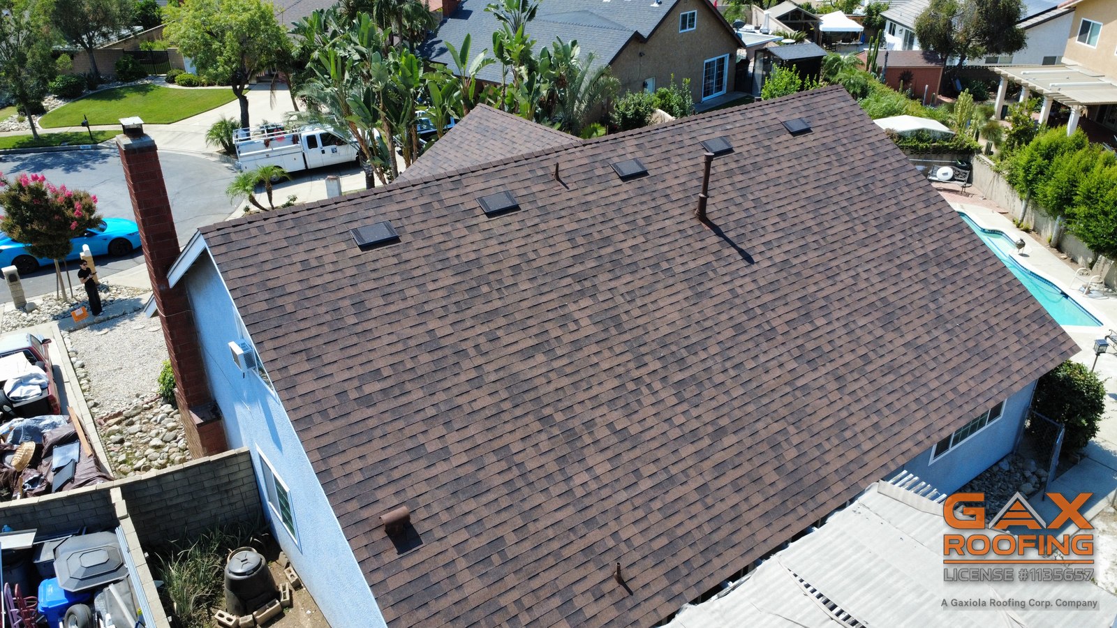 Drone view of a completed shingle roof replacement by GAX Roofing in Upland, CA