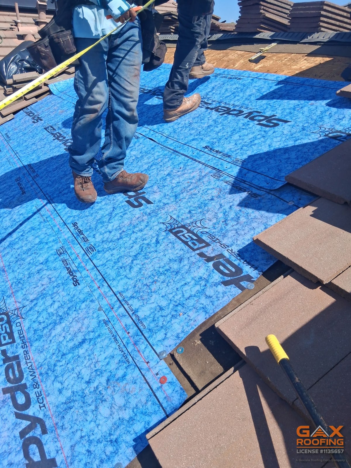 Spyder PSU self-adhered ice and water shield going down over the deck on a Rancho Cucamonga tile roof repair