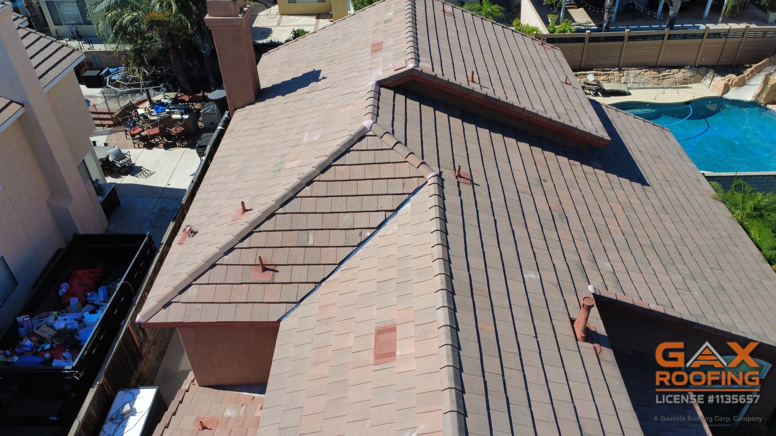 Aerial ridge detail of a finished tile lift and relay in Fontana, CA by GAX Roofing