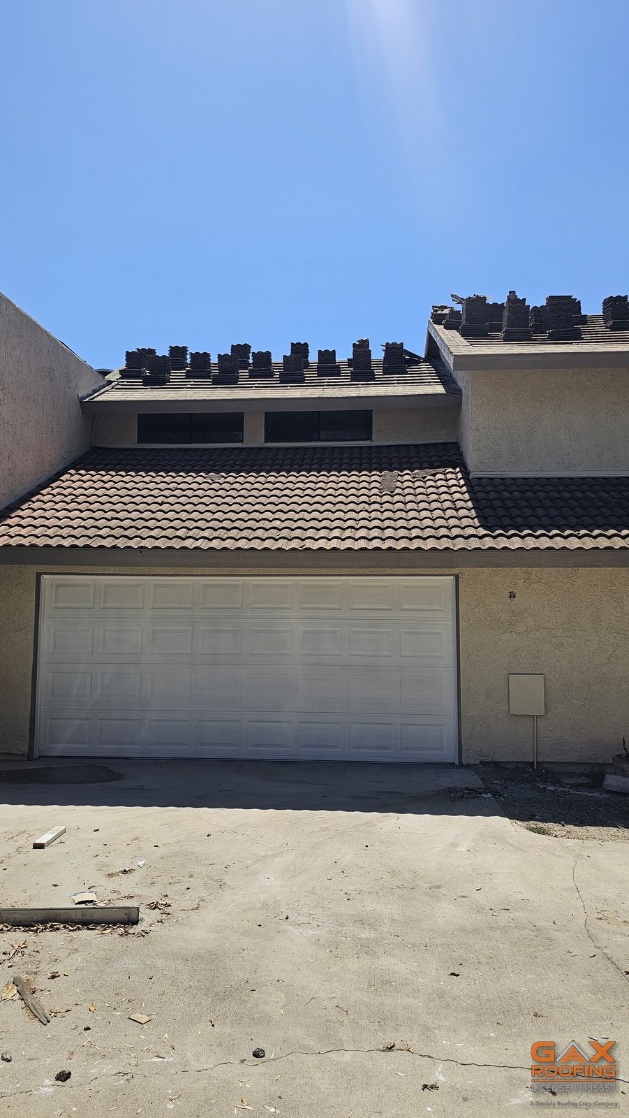 New sheathing going down under relaid tile in Glendora, California