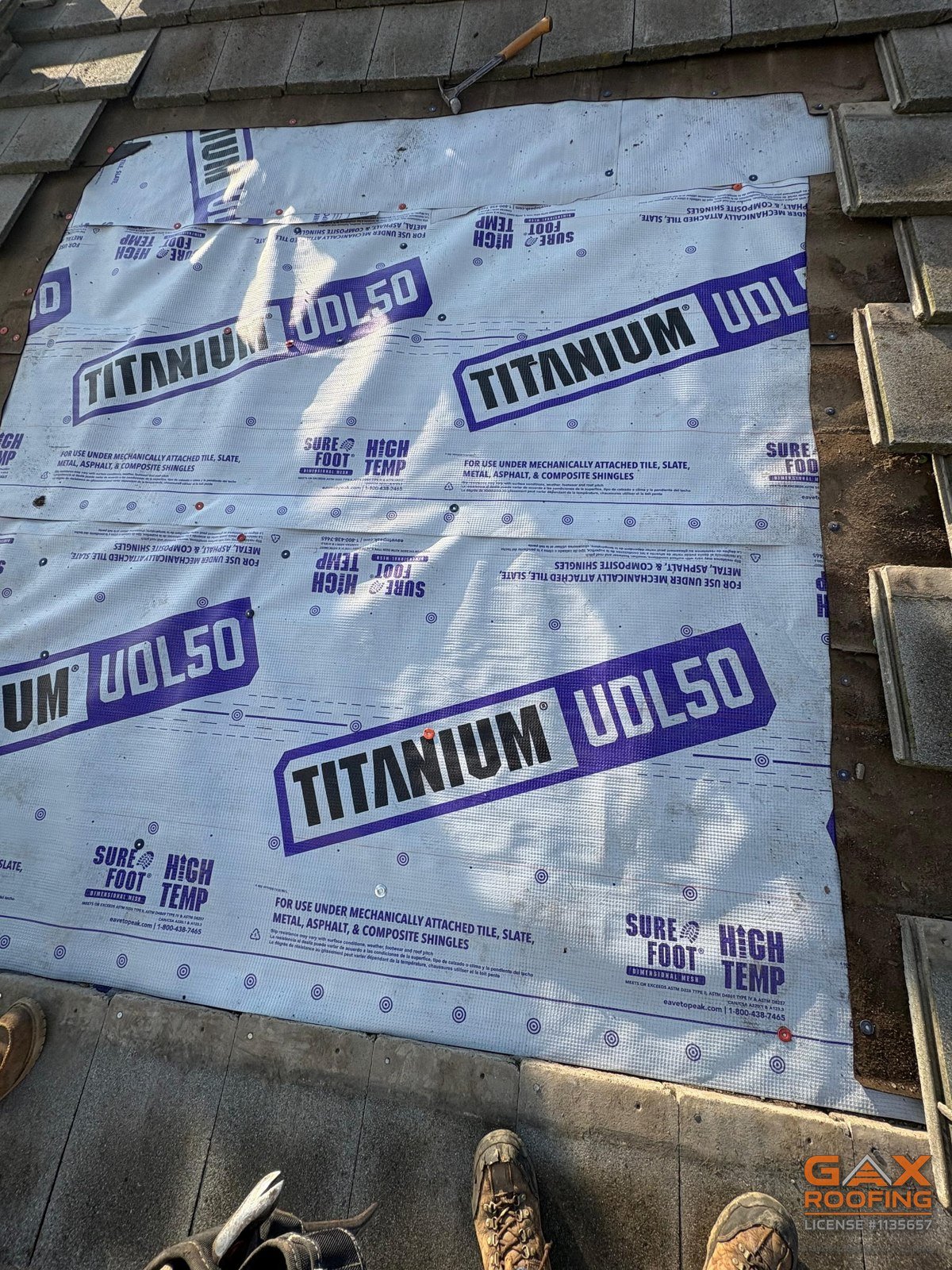 New Titanium UDL50 underlayment installed under lifted tile during a Corona leak repair