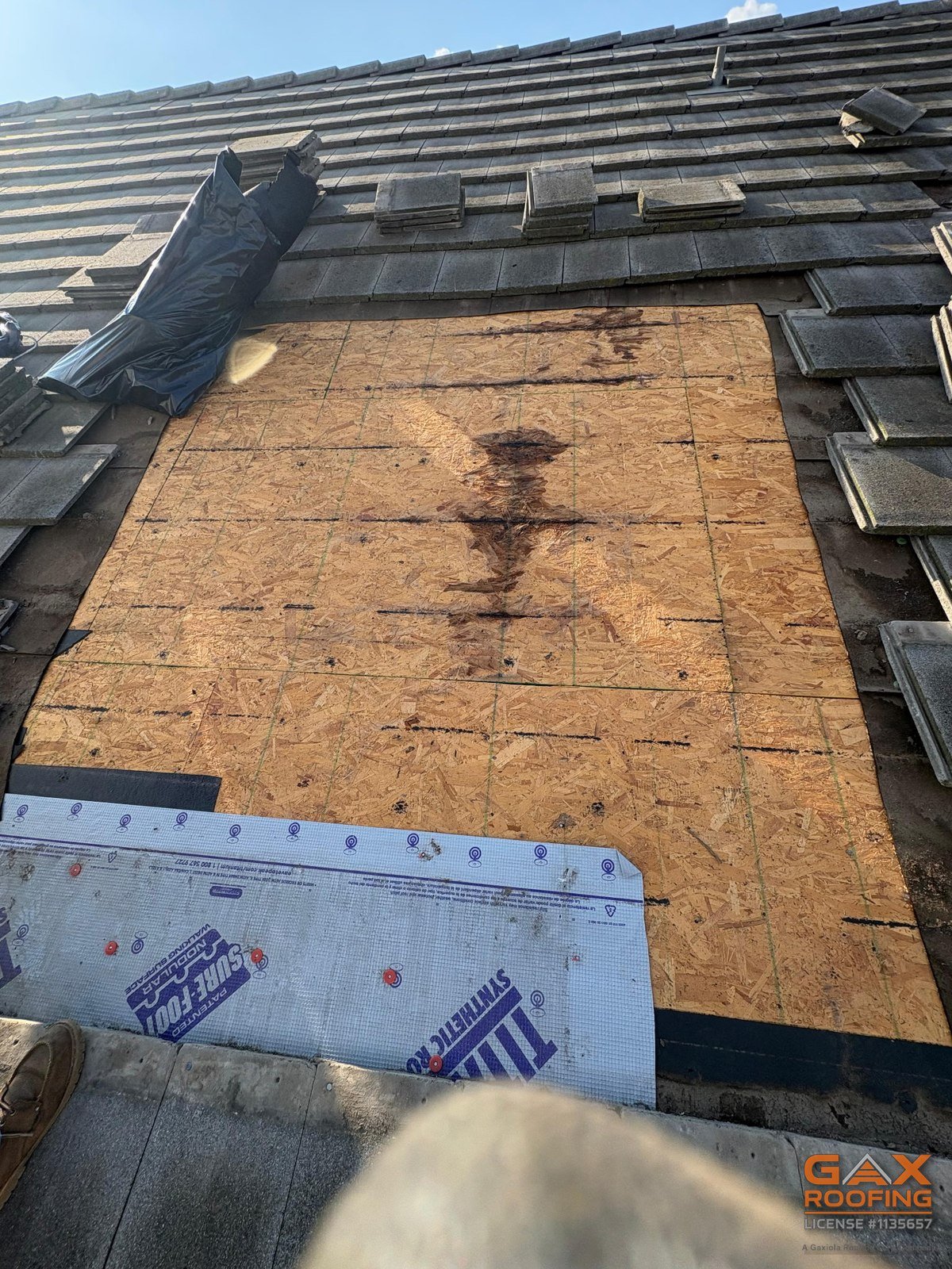 Water staining on bare roof decking found during a tile leak repair in Corona, CA