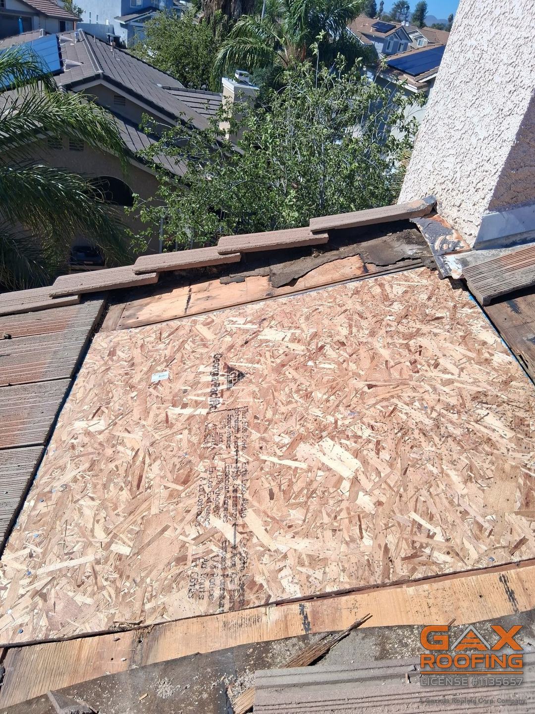New OSB decking installed where the rotted wood was cut out on a Hemet tile roof repair